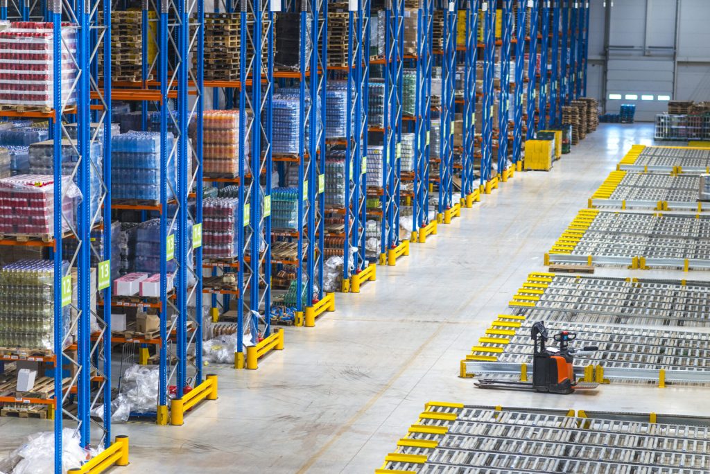 Shows both physical stock + digital system → perfect for Wholesale Inventory Management Software