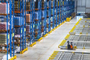 Shows both physical stock + digital system → perfect for Wholesale Inventory Management Software