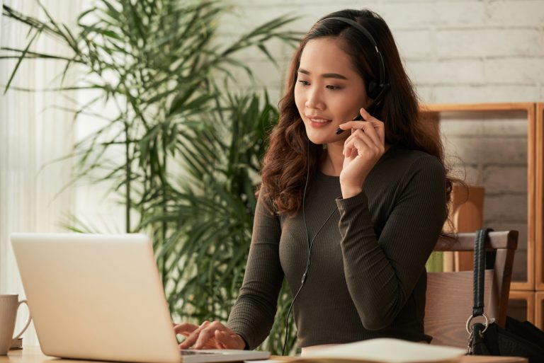 It shows a person wearing a headset, which represents multichat customer service or chat support.