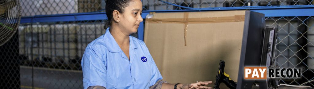 Staff using Warehouse Management System with OMS